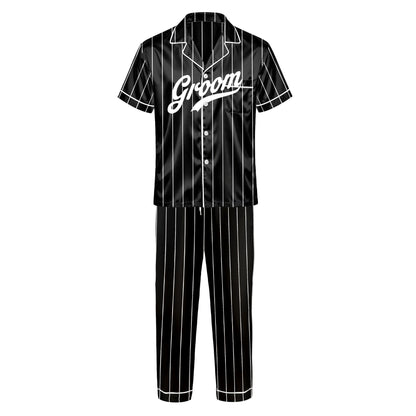 Personalized pajama set in black with white pinstripes and wedding role text, front view