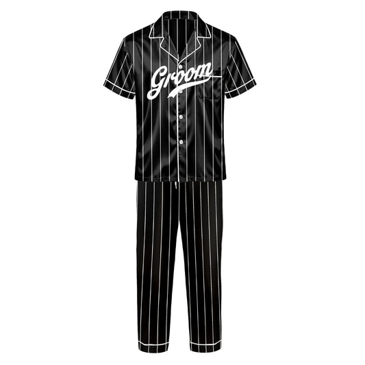 Personalized pajama set in black with white pinstripes and wedding role text, front view