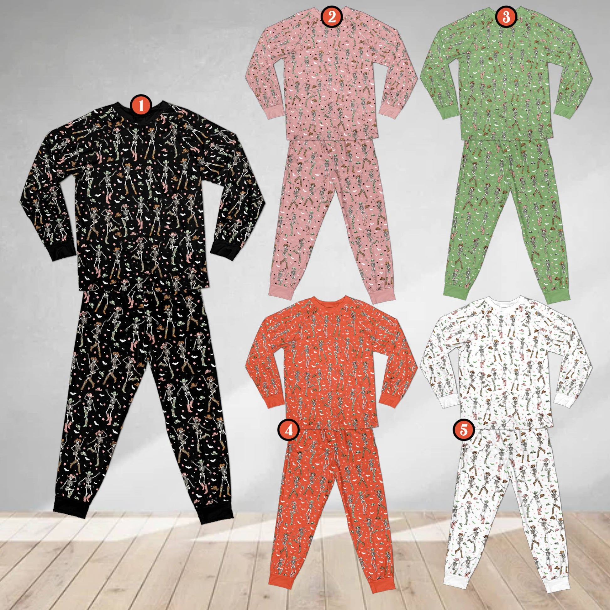 Holiday matching family pajamas featuring western halloween skeletons, front view