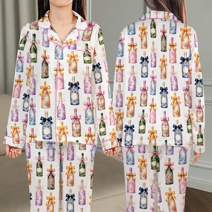 Wine bottles pajama set displaying elegant champagne bottle illustrations, front view