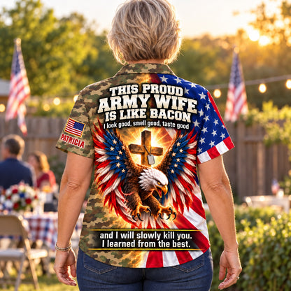 Back of the personalized This Proud Army Wife Is Like Bacon Hawaiian shirt: camo body, American flag eagle with glowing cross and dog tags, custom name under the flag patch on the sleeve