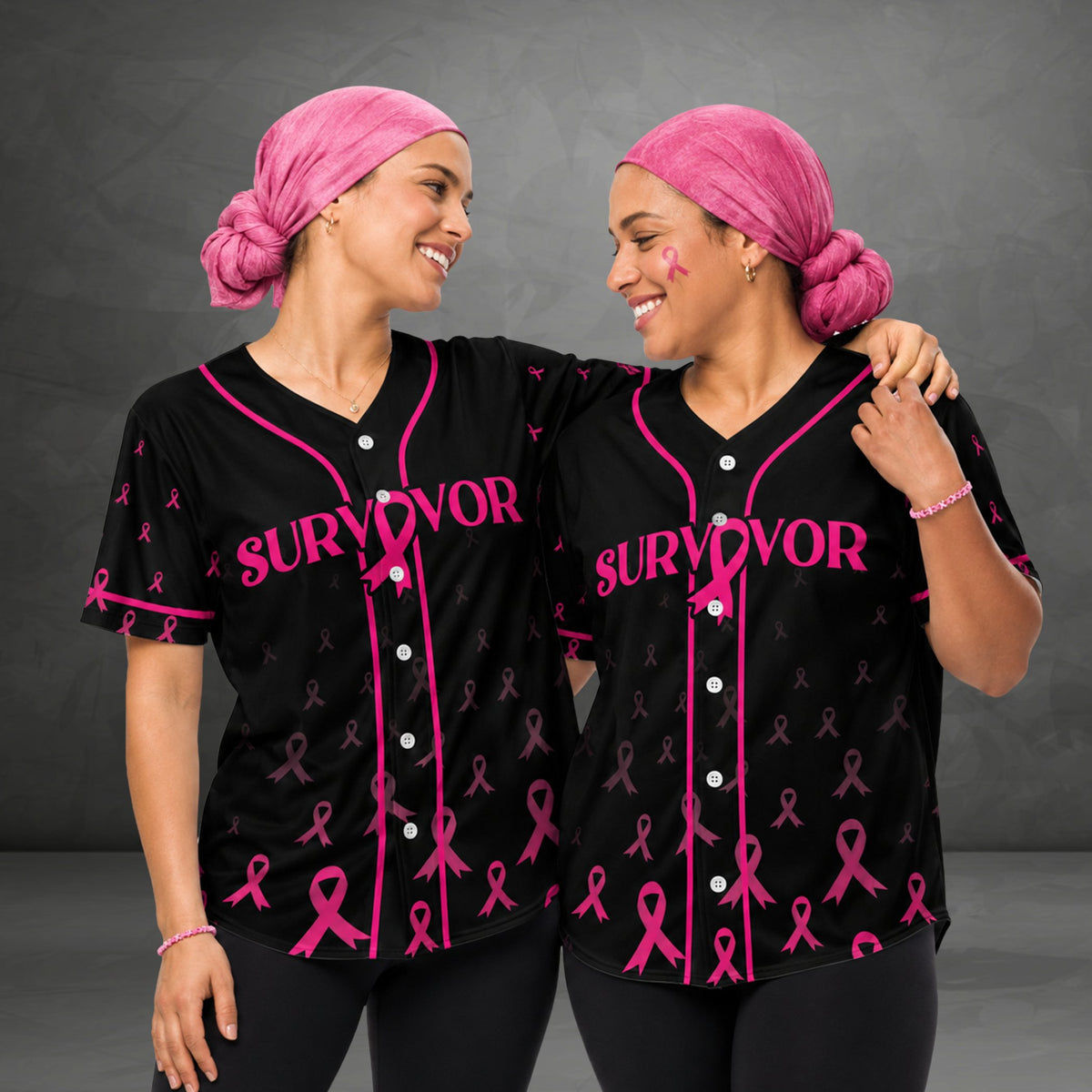 Person wearing a black breast cancer awareness baseball jersey outdoors