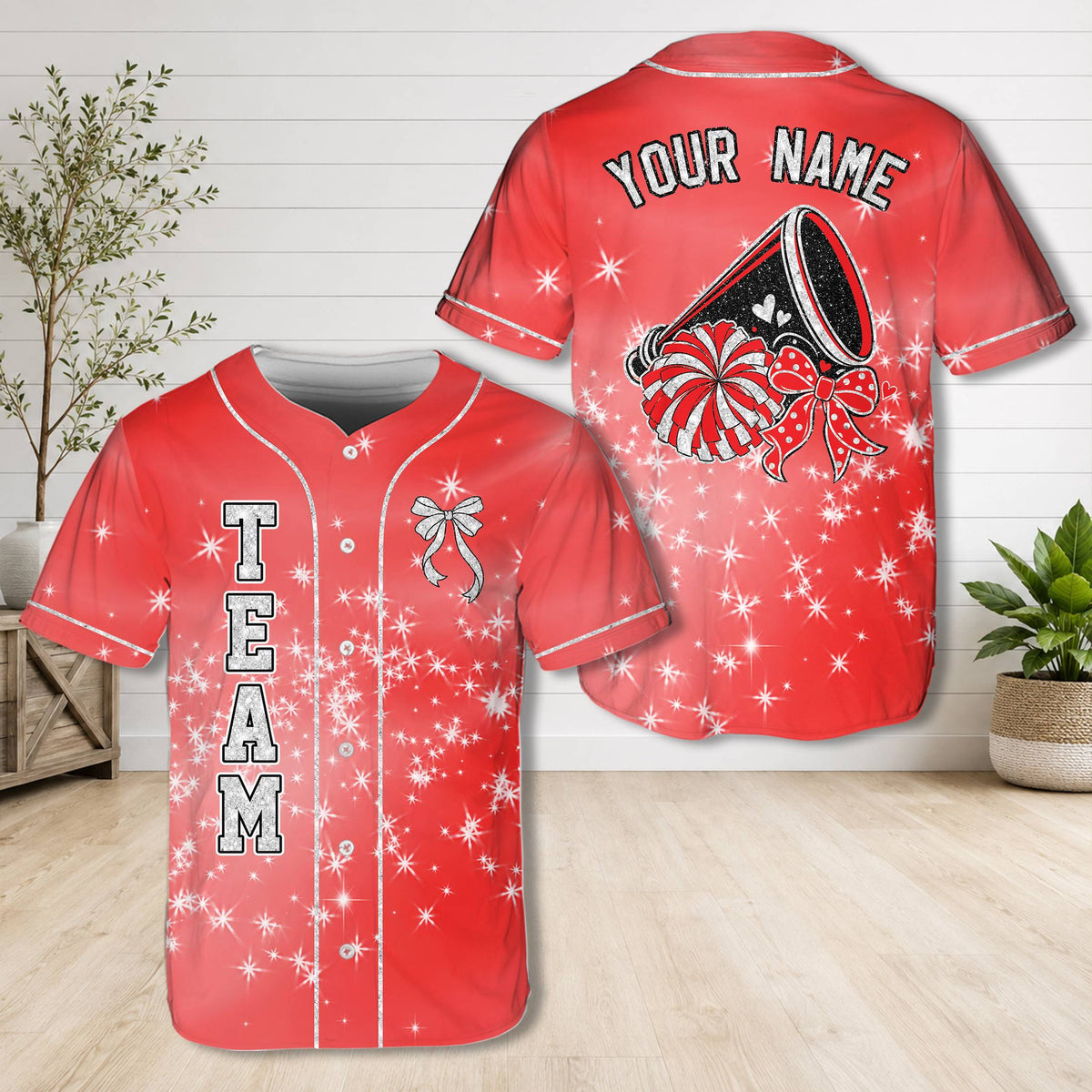 Red cheerleading baseball jersey showing the front design with team text and bow