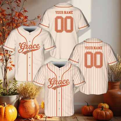 Close-up front view of white faith baseball jersey with script text