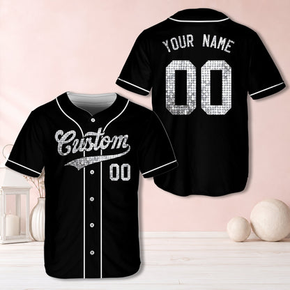 Black personalized baseball jersey with custom name and number in simulated gold glitter/sequin texture, back view