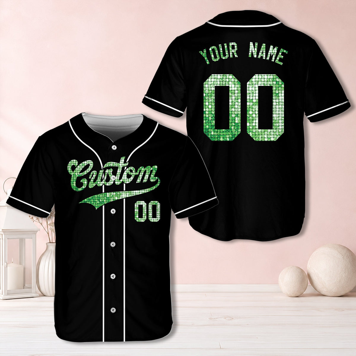 Black personalized baseball jersey with simulated green glitter/sequin text, front view