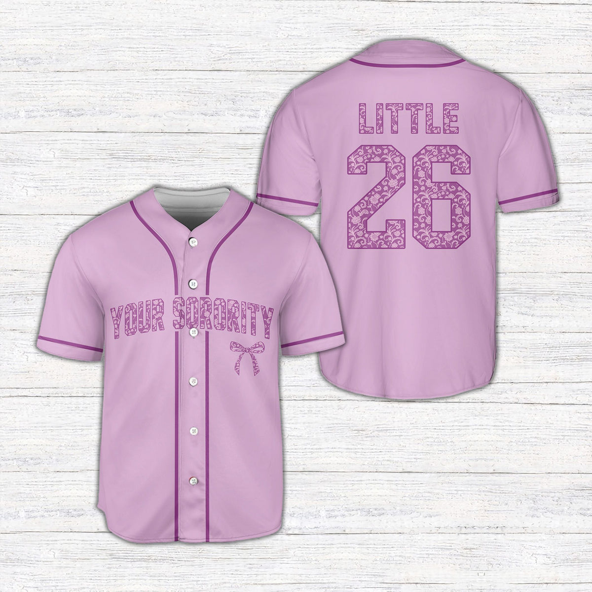 Personalized black sorority baseball jersey featuring floral text and a delicate bow graphic, front view