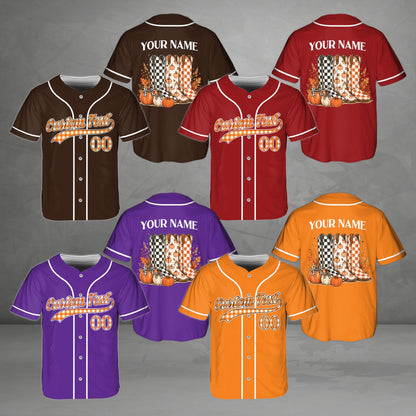 Back view of the personalized baseball jersey showing cowboy boots, pumpkins, and fall leaves