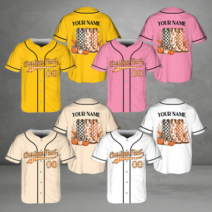 Close-up detail of the custom name and western fall graphics on the baseball jersey