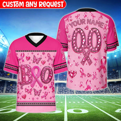 Detail view of the faux-rhinestone breast cancer awareness football jersey