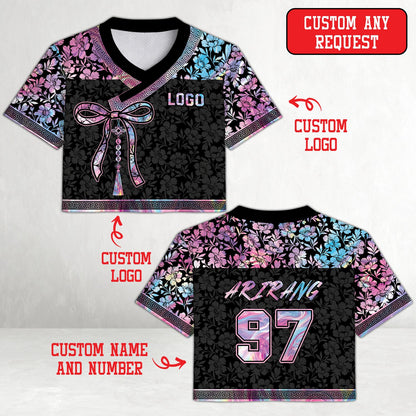 Dark multicolor floral football jersey showing wrap style front