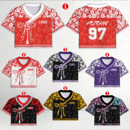 Front view of red floral football jersey with wrap-style knot detail
