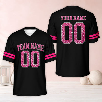 Front view of a pink variant personalized football jersey with faux glitter text