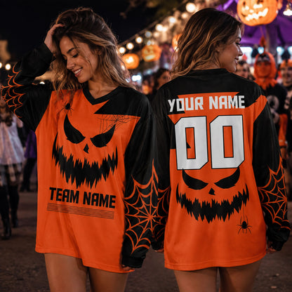 Lifestyle view of adult wearing the custom name hockey jersey with Halloween spider web graphics