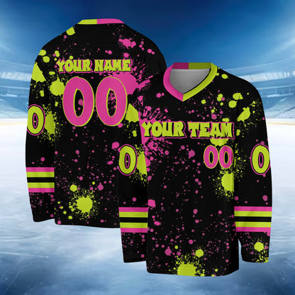 Front view of a personalized black paint splatter hockey jersey
