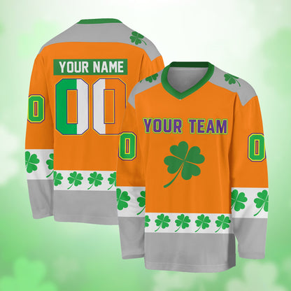 Orange St. Patrick's Day hockey jersey featuring four-leaf clover design, front view