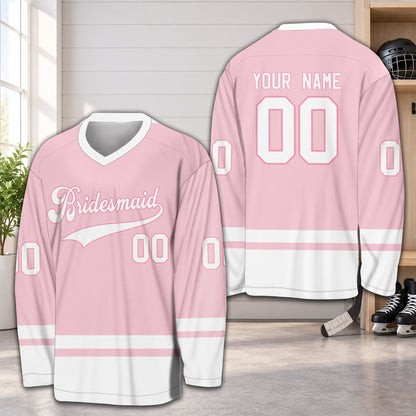 Pink personalized hockey jersey showing custom name and number, back view