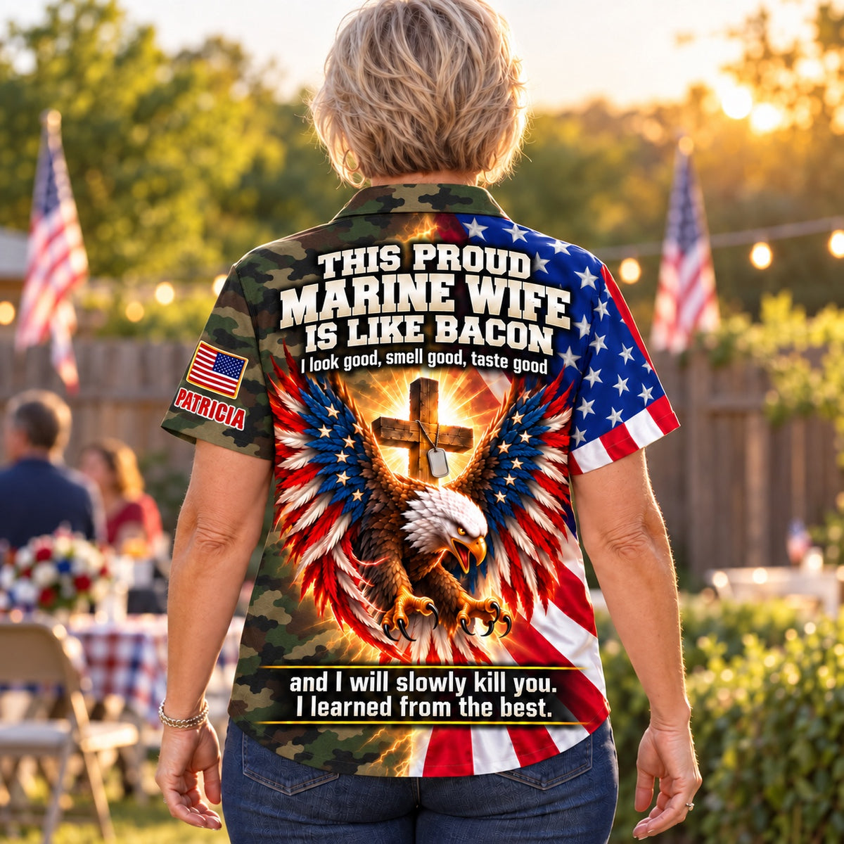 Marine Wife style, back: This Proud Marine Wife Is Like Bacon over an American flag eagle and glowing cross on woodland camo, custom name on the sleeve