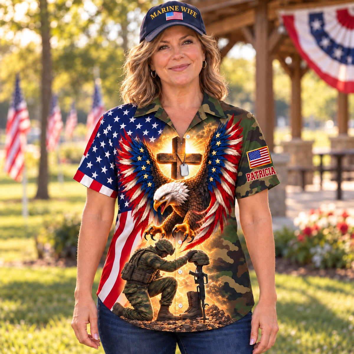 Front of the personalized Marine wife Hawaiian shirt: American flag eagle, glowing cross with dog tags and a kneeling Marine at a battlefield cross on a woodland camo body, custom name on the sleeve