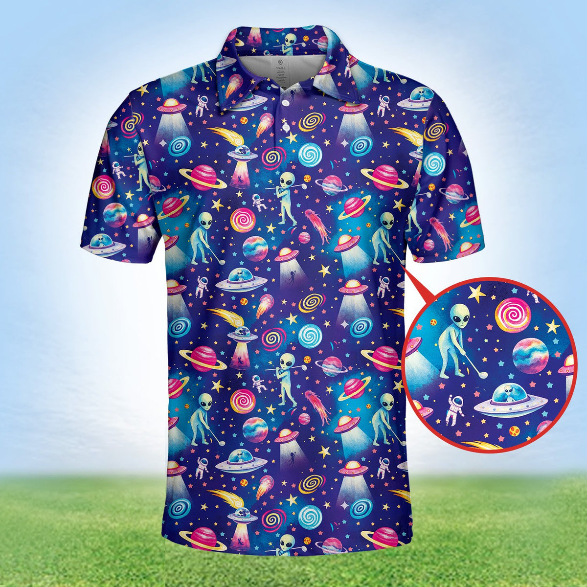 Detail of flying saucers on navy alien polo shirt