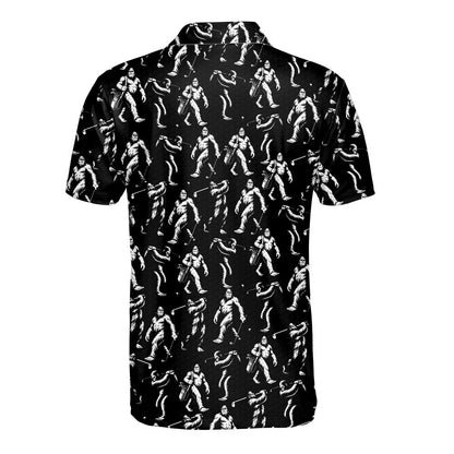 Black bigfoot polo shirt featuring white bigfoot figures golfing, back view