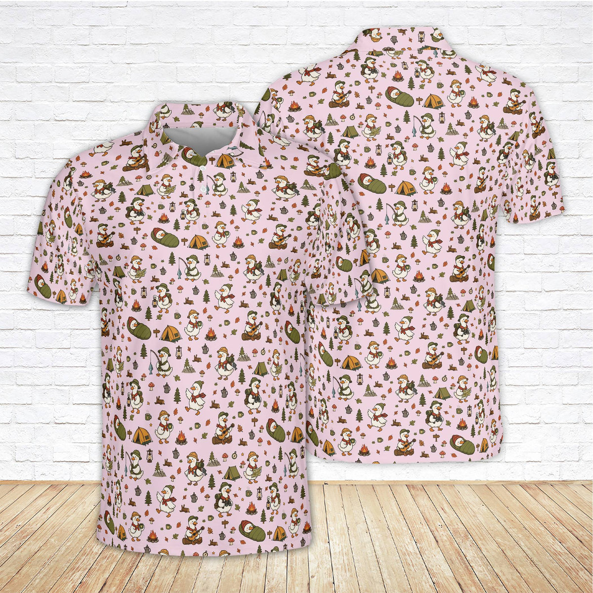 Pink camping polo shirt with cartoon goose playing guitar, front view
