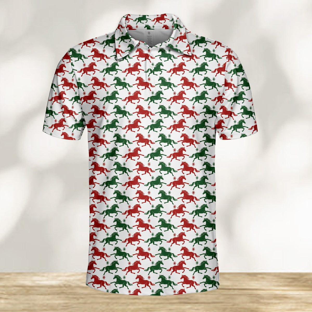 Front view of the holiday polo shirt highlighting the starburst accents