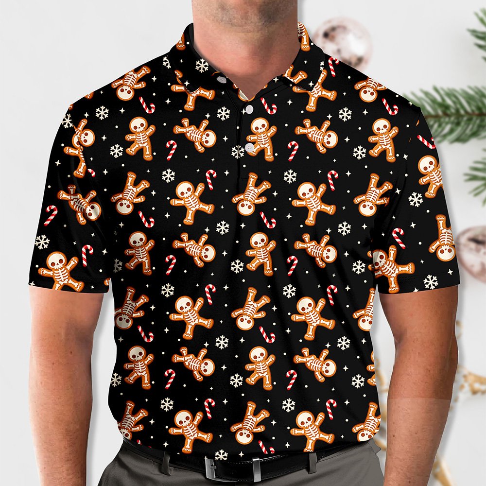 Lifestyle view of an adult wearing the holiday skeleton gingerbread polo shirt