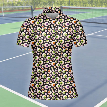 Front view of the cartoon eyeballs polo shirt on model