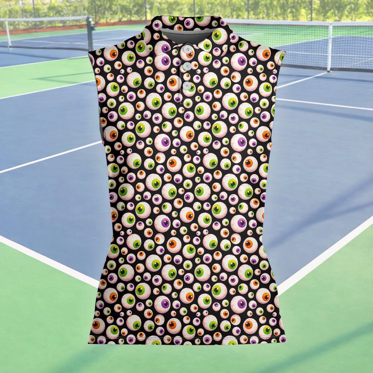 Detailed front view of the eyeball pattern on the black polo shirt