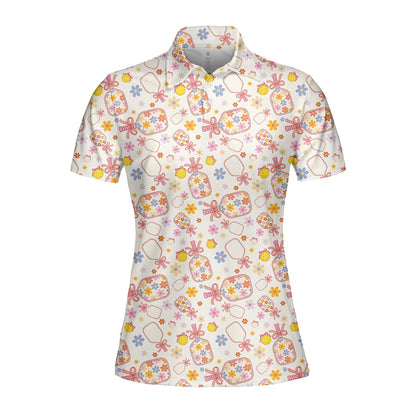 White floral polo shirt featuring a floral pickleball paddle pattern, front view