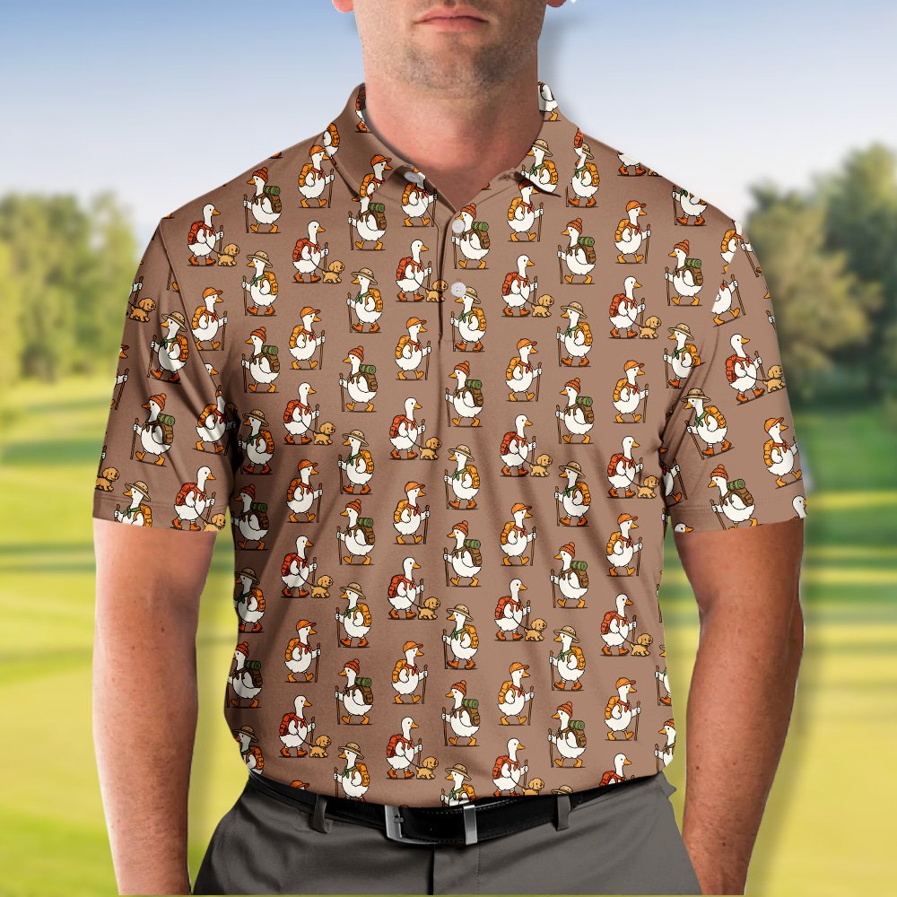 Detailed front view of the brown hiking polo shirt with ducks, backpacks, and walking sticks