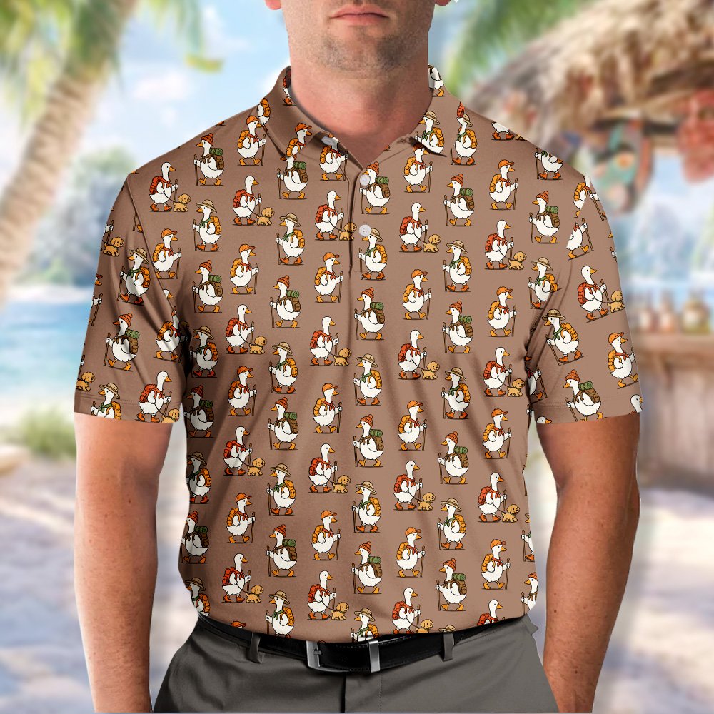 Close-up front view of the brown polo shirt highlighting the cartoon duck pattern