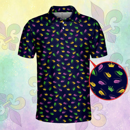 Front detail of the navy mardi polo shirt with purple, green, and gold motifs