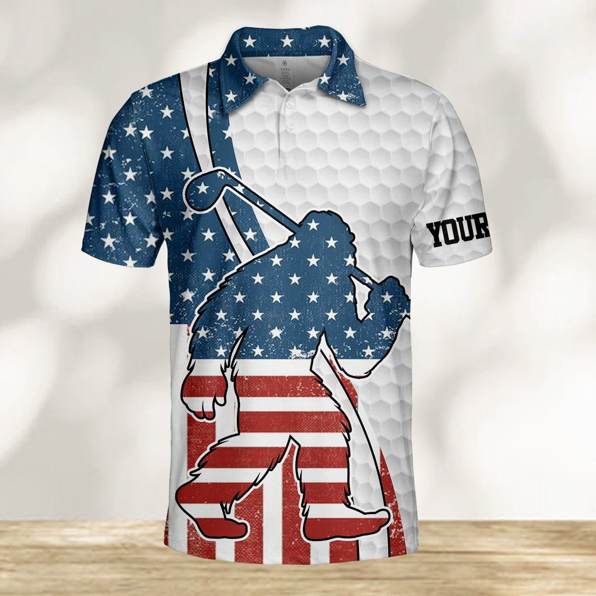 Patriotic bigfoot polo shirt featuring a custom name and American flag design, main view