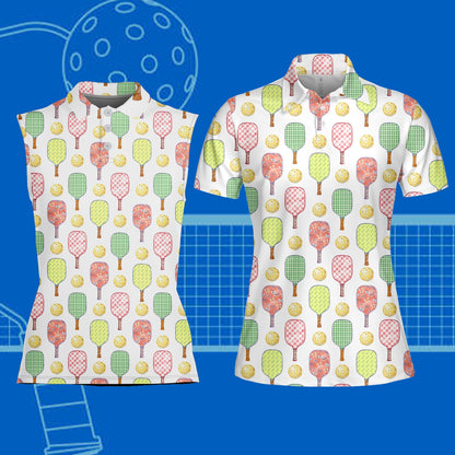 Adult wearing white pickleball polo shirt with paddle pattern on the court