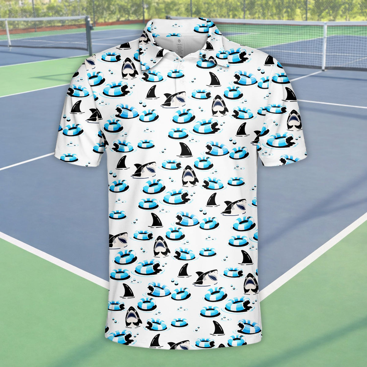 Another front view of the fun shark pattern on the polo shirt