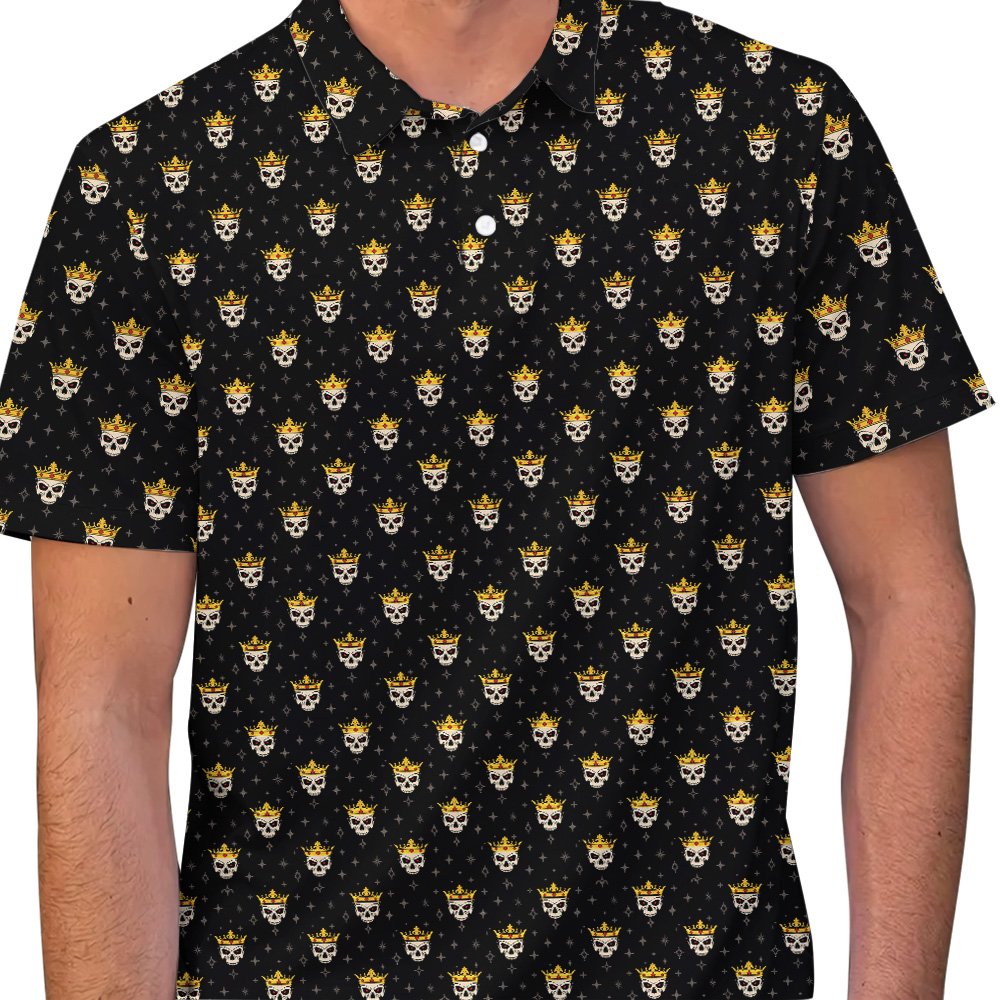 Detailed front view of the white skulls and gold crowns on the polo