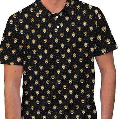 Detailed front view of the white skulls and gold crowns on the polo
