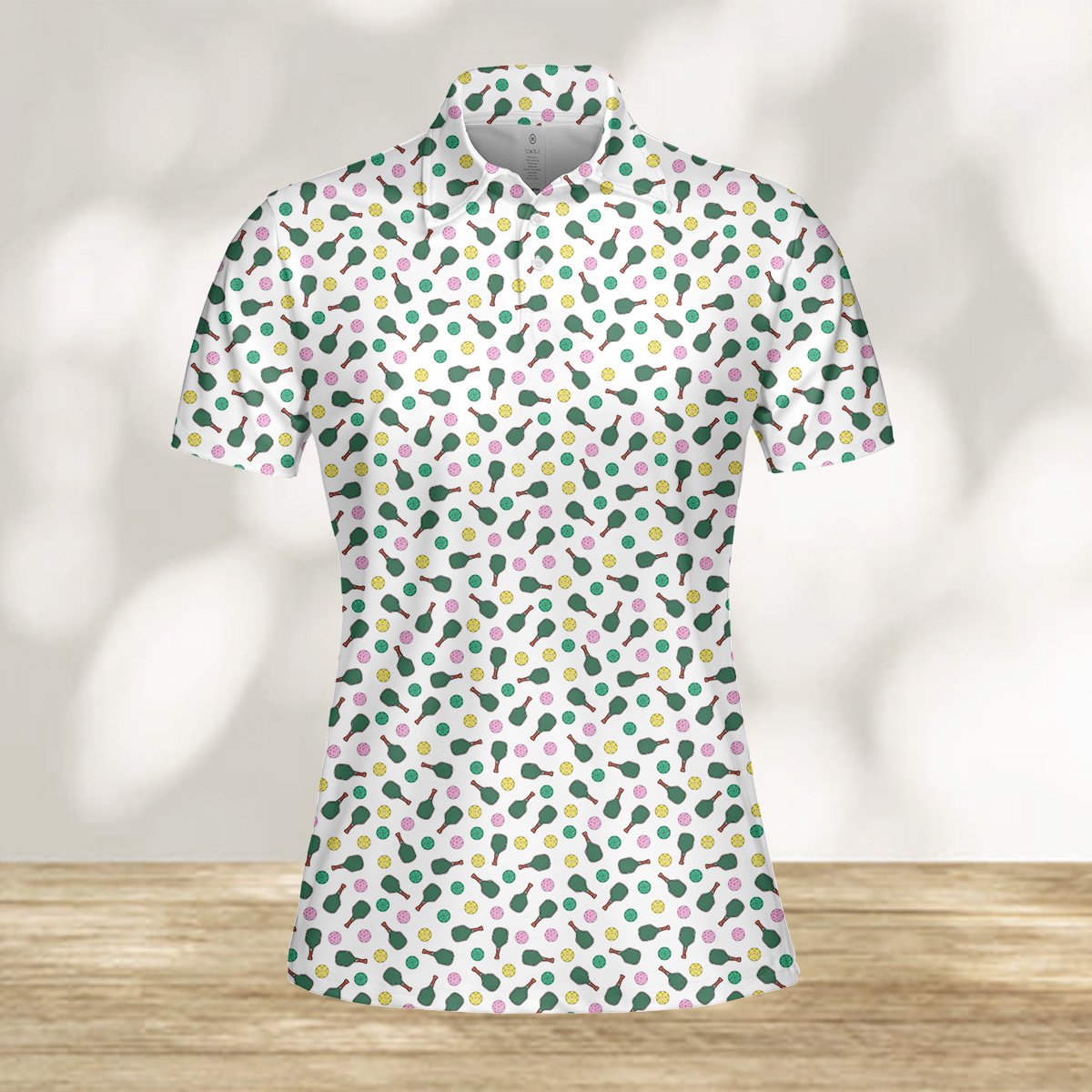 Lifestyle image of person wearing the sports polo shirt with pickleball pattern