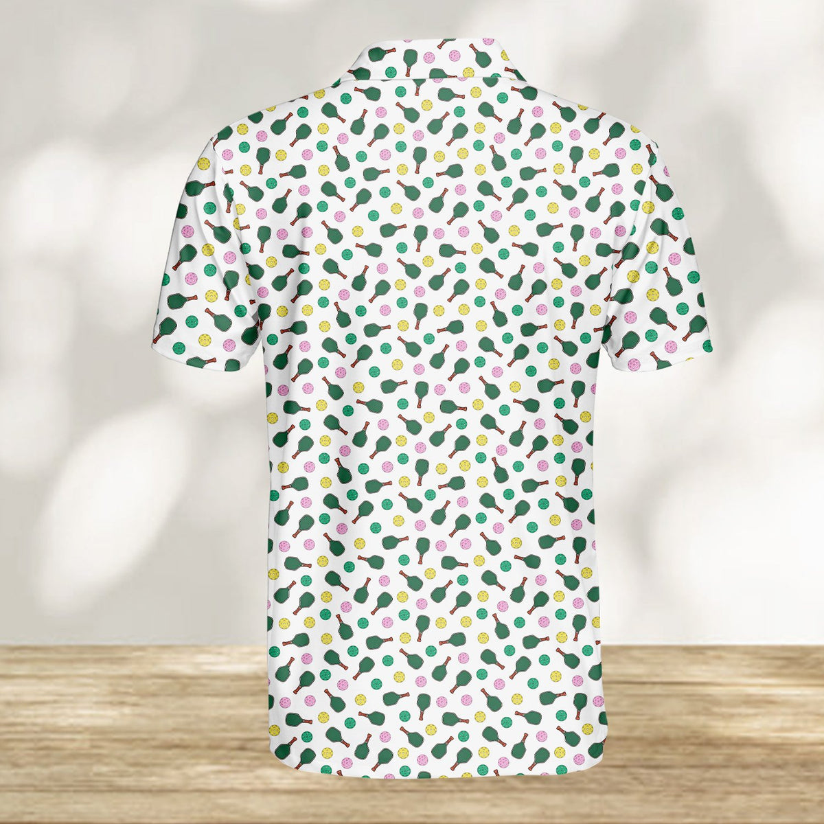 Sports polo shirt with pickleball pattern, back view