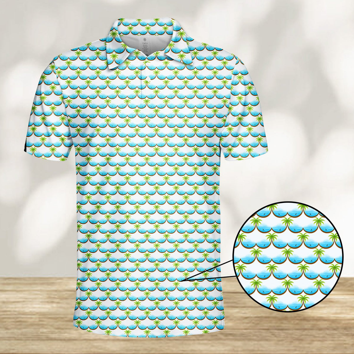 White tropical polo shirt with palm trees and ocean waves, front detail view