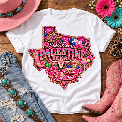 Personalized She's From Palestine Texas I Can Tell t-shirt on White, pink glitter Texas with rhinestone border, leopard cowgirl hat, flag, boots, longhorn and custom name and year banner NEW2