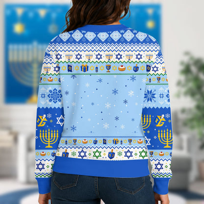 Person wearing blue chrismukkah ugly sweater at a holiday party