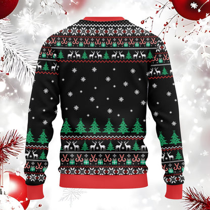 Close up of the back pattern on the adult ugly sweater featuring trees and candy canes