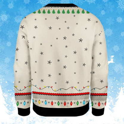 Back view of the beige Christmas ugly sweater with scattered black snowflakes and border details