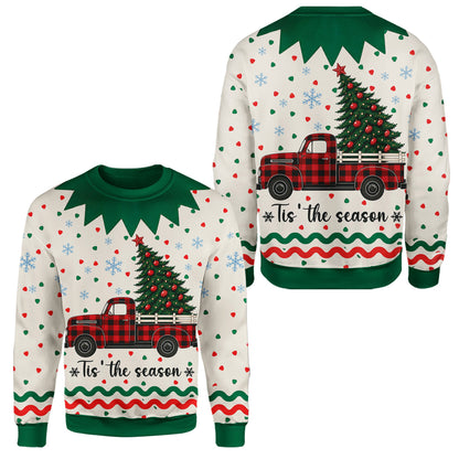 Close-up front view showing snowflakes and plaid truck design on the ugly holiday sweater