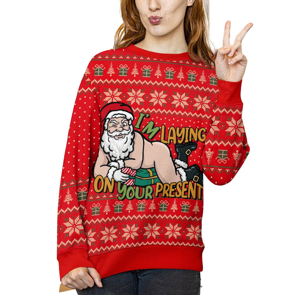 Lifestyle shot of a man in the funny christmas ugly sweater smiling