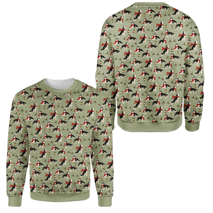Green husky ugly sweater with red scarves and snowflakes, front view