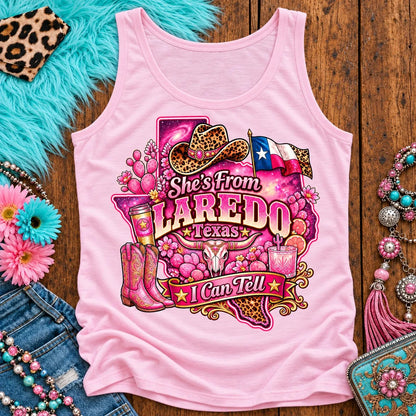 She's From Laredo Texas I Can Tell pink cowgirl tank top, galaxy Texas, leopard hat, boots and longhorn design on Light Pink